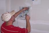 Tech Installing Alarm Panel Gasonade county Missouri